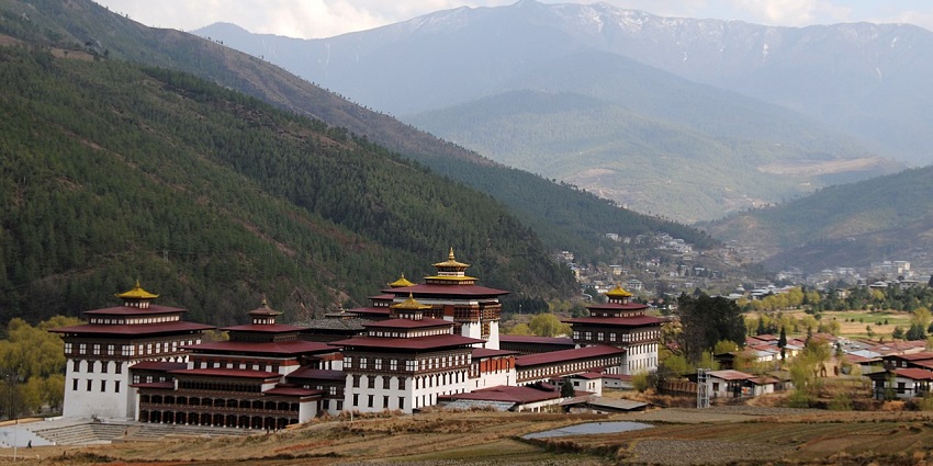 The Royal Palace complex in Thimphu Valley is surrounded by wooded hill regions.
