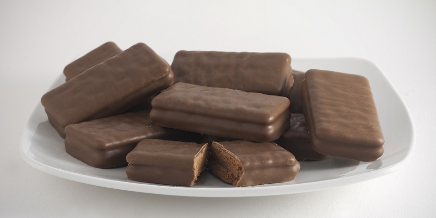 Image of a plate of Tim Tams, one of the famous things to buy in Australia.