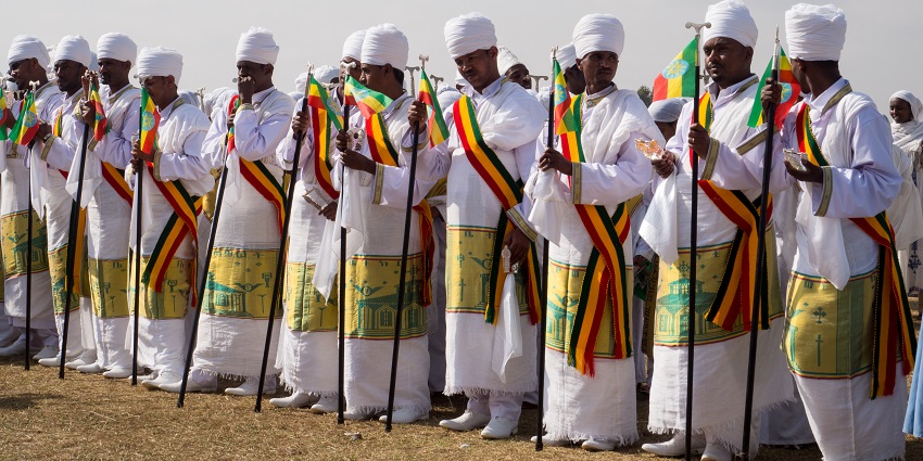 Priests dressed in white lead the Timket procession during one of the festivals in Ethiopia.