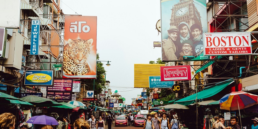 Busy market street in Phuket, offering a variety of local goods, food stalls, and unique finds.