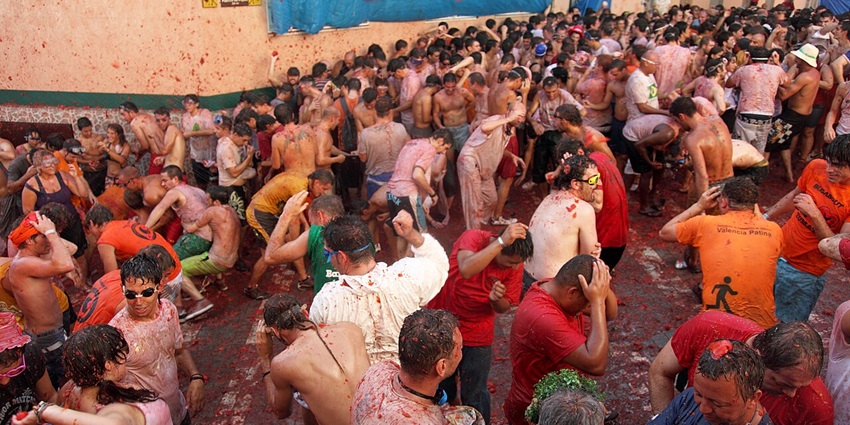 Young children have fun during this festival by throwing squashed tomatos all over.