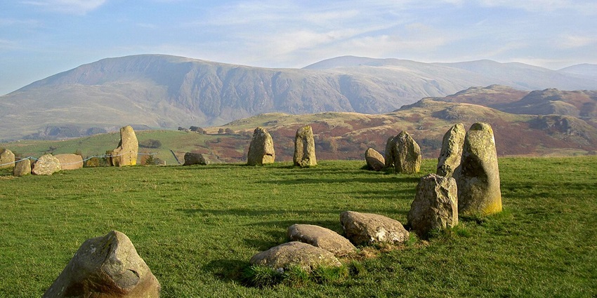 Marvel at Castlerigg Stone Circle, a mystical prehistoric monument set against sweeping mountain views.