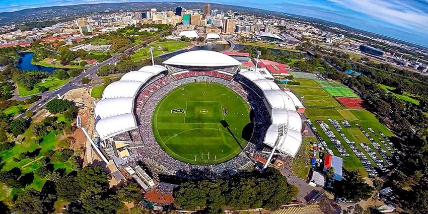 An image showing an aerial view of the Adelaide Oval, a famous place in Adelaide.