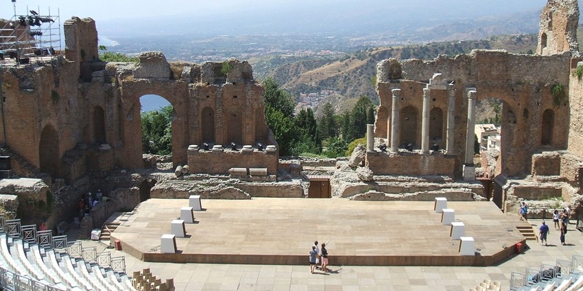 Visit Taormina’s Greek Theatre with sea views and Mount Etna as its dramatic stage backdrop, among the best things to do in Sicily, Italy.
