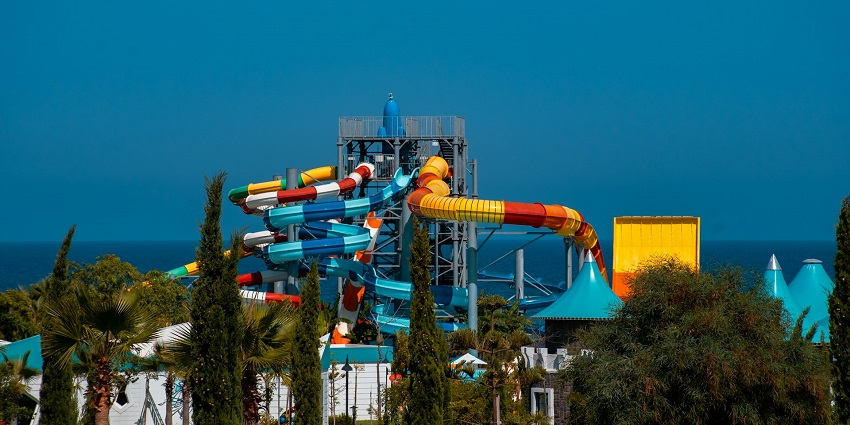 People participating in various exciting adventure sports at a water park in Mohali