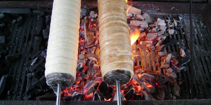 An image of fresh chimney cakes at the market, the top things to see in Budapest in February.
