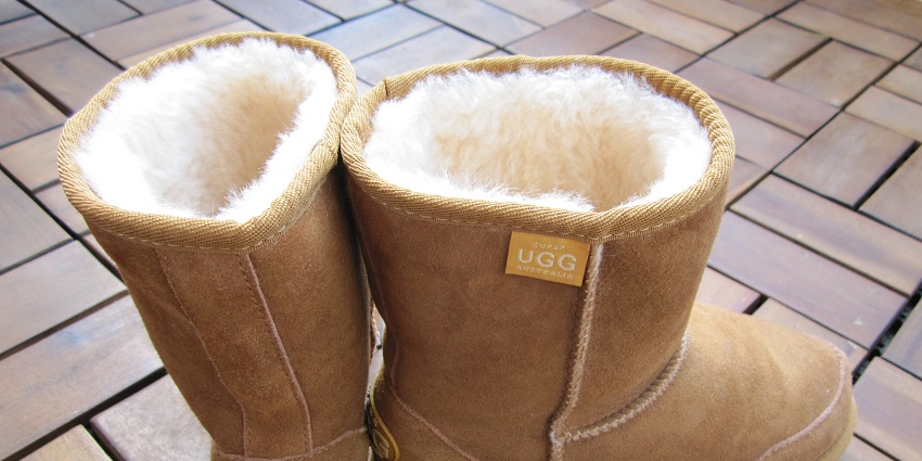 Image of Ugg boots on the wooden floor, among the popular things to buy in Australia.