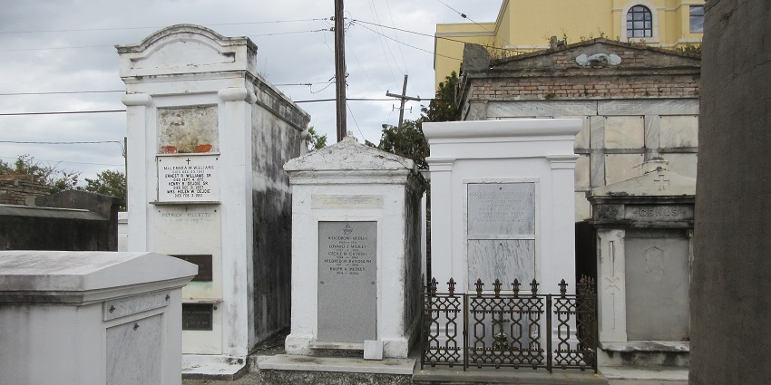 Explore St. Louis Cemetery No. 1, home to centuries-old tombs and the resting place of Voodoo Queen Marie Laveau.