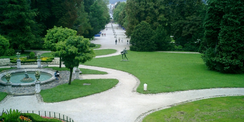 Things to do in Ljubljana include strolling through the largest park, filled with fountains, tree-lined paths, and open-air art.