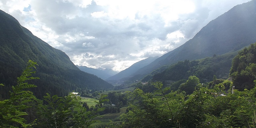 A sunny landscape of Val di Sole, one of the best places for photography in Italy.