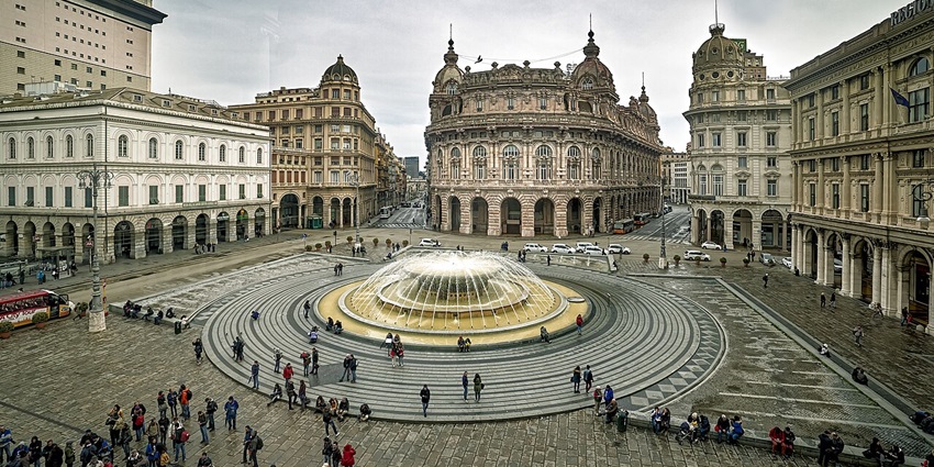 Piazza de Ferrari with a grand fountain and surrounding buildings is a must-see thing to do in Genoa.