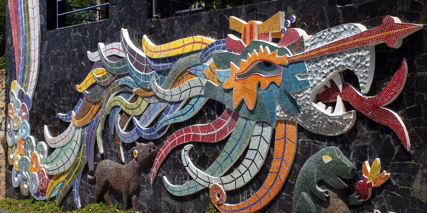 An image of the Diego Rivera mural covering the wall of a house in Acapulco.