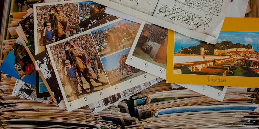 Hand-drawn or printed artworks from Montmartre capture Parisian charm and street scenes.