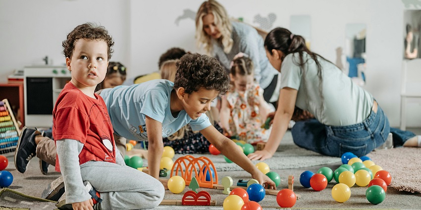 Kids enjoy supervised activities, games, and creative workshops in a themed adventure zone.