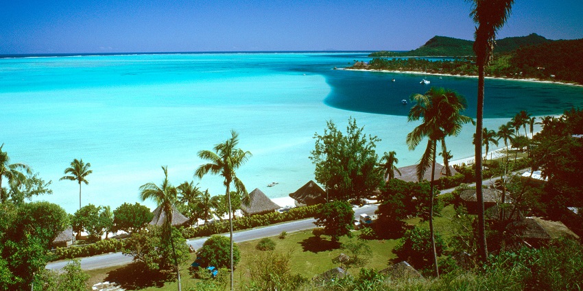 Relax on Matira Beach, the most famous stretch of white sand, with calm turquoise waters.