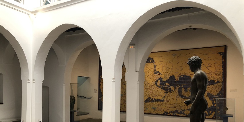 An inside view of the Kasbah Museum in Morocco featuring majestic statues and more.