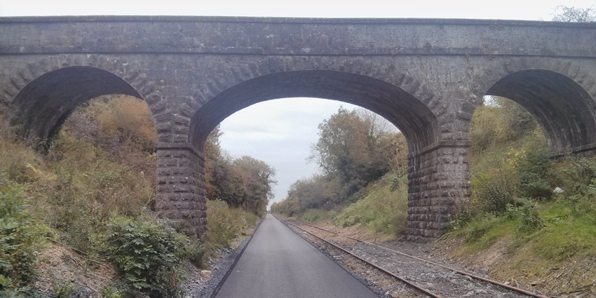 An image of Rail Trail Greenway surrounded by dense greenery, one of the best things to do in Athlone