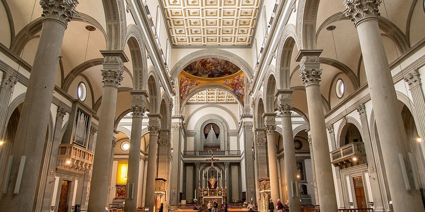 San Lorenzo Cathedral with striped stone façade and arched doorway is a historic thing to do in Genoa.