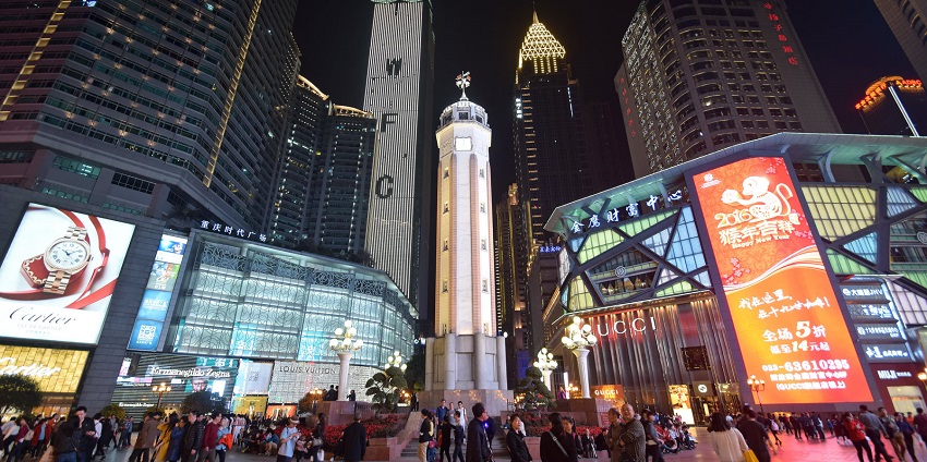 Things to do in Chongqing include exploring the bustling shopping and cultural district surrounded by tall skyscrapers and vibrant nightlife.