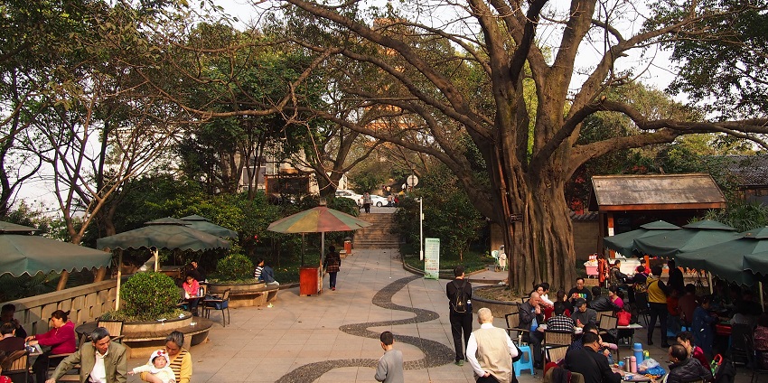 A peaceful park with historical buildings, scenic views of Chongqing, and lush green spaces