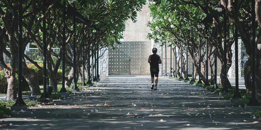 People are jogging along paths; walking here is one of the popular things to do in Aventura, Florida.