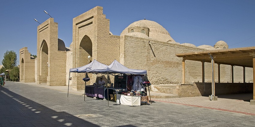 Wander bustling market aisles lined with spices, textiles, pottery, and handmade crafts.