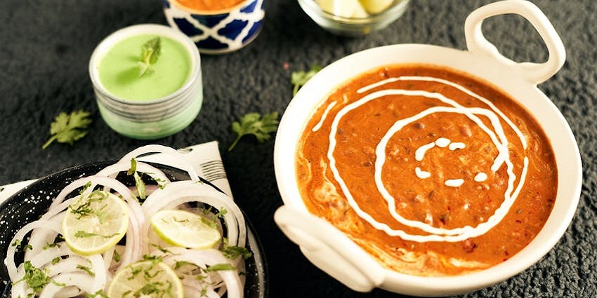 A delicious spread of Indian food served in a vibrant and welcoming dining setting