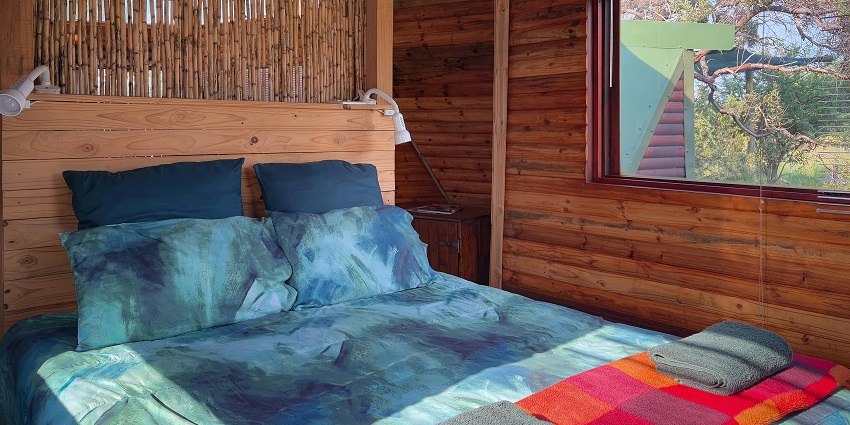 Image of hotel room form the inside with the wooden decoration and clear ambience