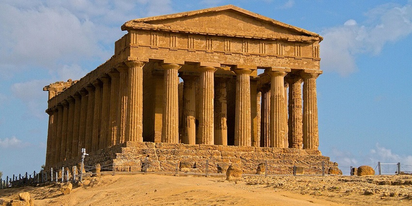 Wander among ancient Doric temples in Agrigento’s Valley of the Temples, glowing at sunset, among the best things to do in Sicily, Italy.
