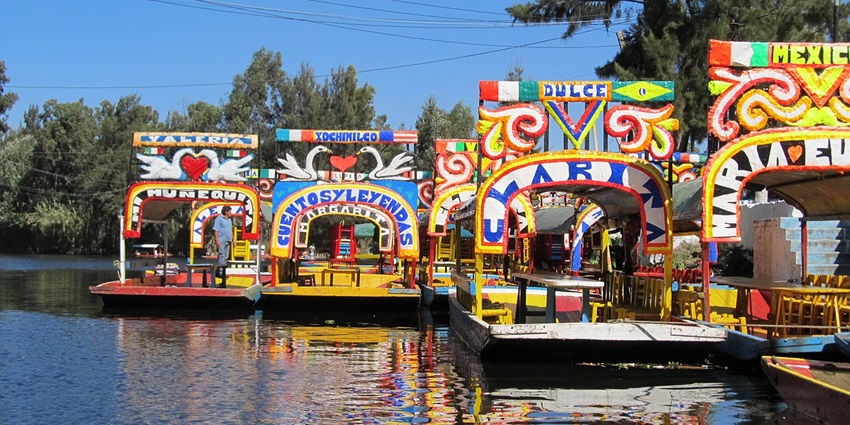 One of the spots to celebrate the Day of the Dead Festival is floating on the Xochimilco canals.