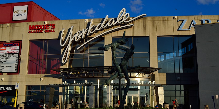 A modern storefront of the Yorkdale Shopping Centre, one of the most famous malls in Toronto.