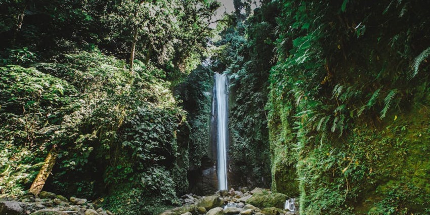 Big waterfall with water falling into the lake, one of the best waterfalls in Peru