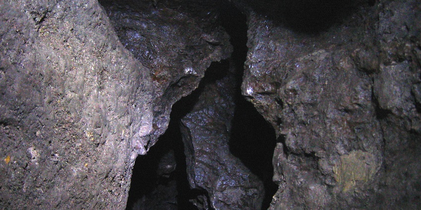 an image of Zolushka Cave, a large maze famous for its gypsum patterns among Ukraine Caves