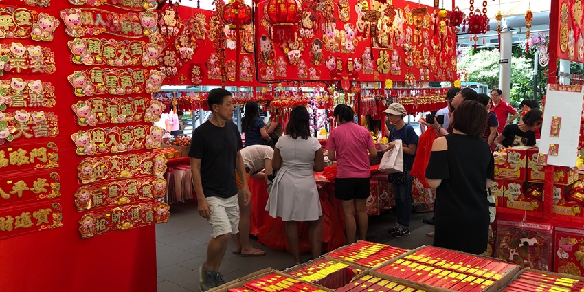 -Traditional Chinese temple with red lanterns is among the things to do in Tiong Bahru.