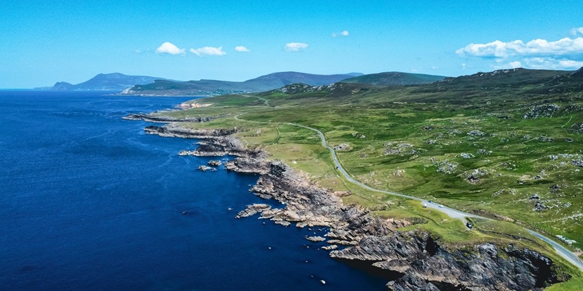 One of the largest islands in Ireland with cliffs, blue flag beaches, and mountain trails.