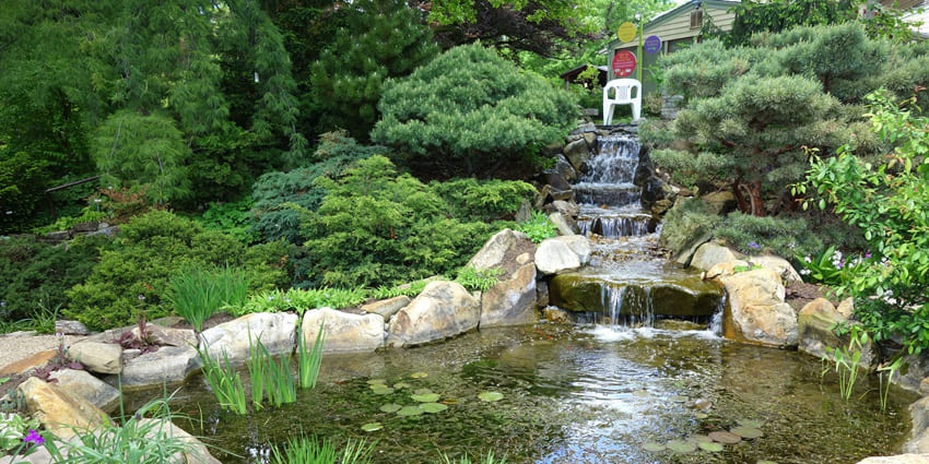 Adena Mansion & Gardens is a historical place to visit in Ohio, surrounded by lush trees.
