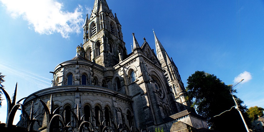 Gothic spires of St. Fin Barre’s Cathedral seen from the surrounding gardens.