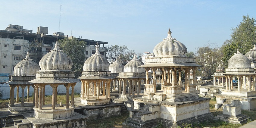 Historic royal cremation site with over 250 cenotaphs featuring domes and carved pillars.