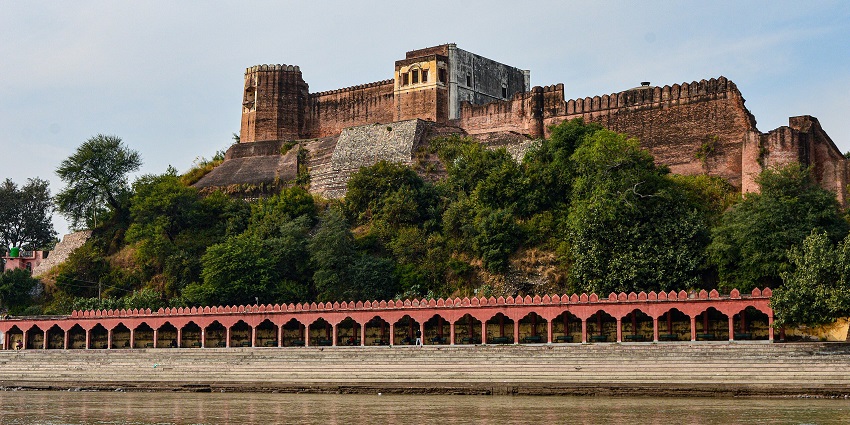 Historic Akhnoor Fort in Jammu overlooking the Chenab River with ancient stone walls