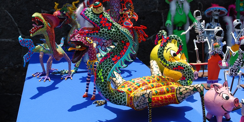 Things to buy in Mexico include alebrijes, mythical creatures, crafted by skilled artisans