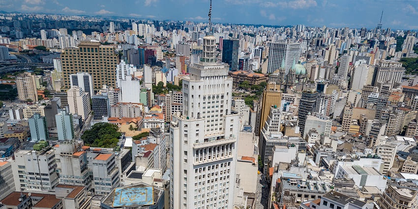The towering Altino Arantes Building features Art Deco architecture with a central spire.