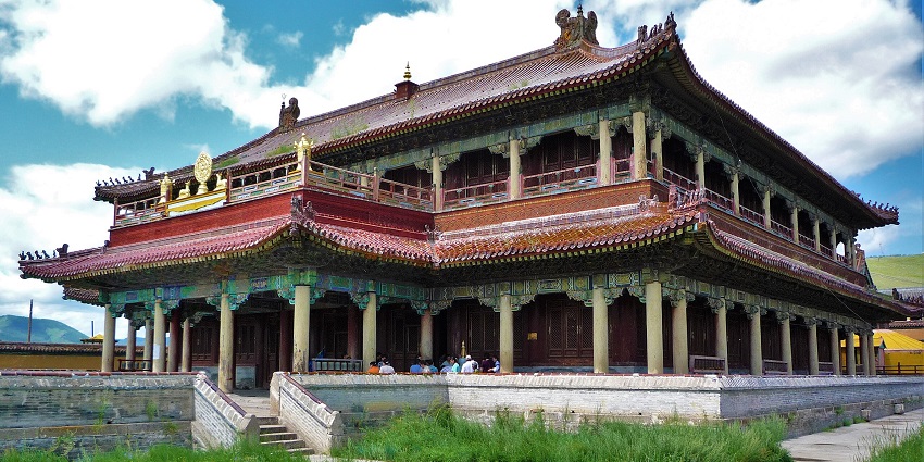 Amarbayasgalant Monastery with traditional Mongolian architecture and green grass