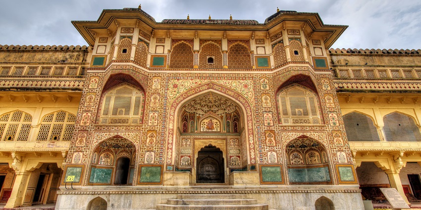 Hilltop fort with courtyards, mirrored halls, stone-paved ramps, among the best places to visit in Jaipur in June.