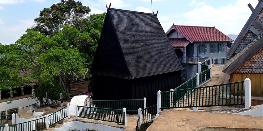 A view of the stone entrance gate at the Royal Hill of Ambohimanga, showing its brick structure.