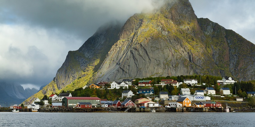 Photograph dramatic cliffs, whales, and vast skies on the windswept island of Andøya.