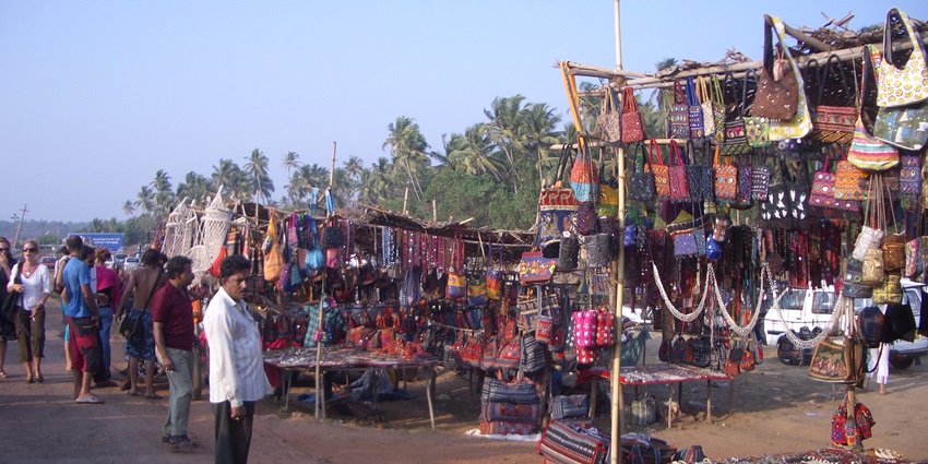 Anjuna flea market with multiple vendors selling souvenirs, one of the places to visit in Goa in February.