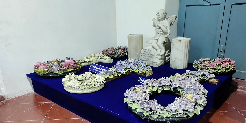 Intricately crafted porcelain flower wreaths, on the guide of what to buy in Pondicherry.