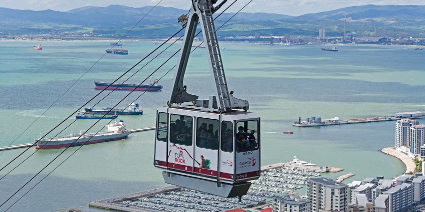 Gibraltar from the cable car ascending to the Upper Rock, with panoramic sea vistas.