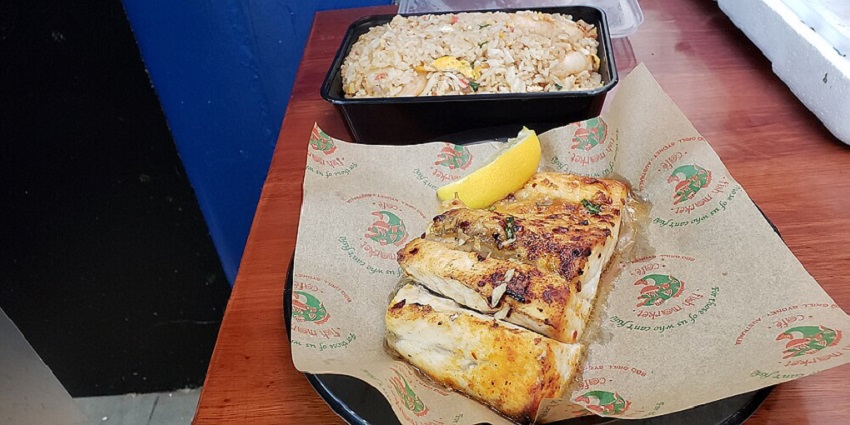 Freshly grilled Barramundi, rich in flavor, straight from Sydney Fish Market’s finest seafood.