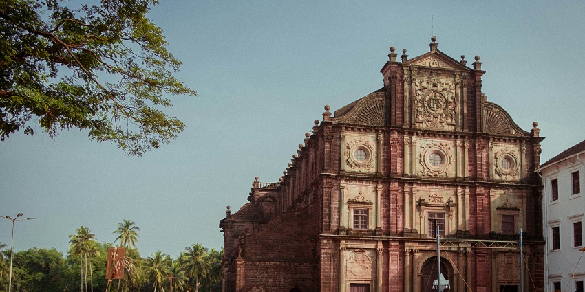 Facade of Bom Jesus Basilica in Goa, showcasing Baroque architecture and historic charm.
